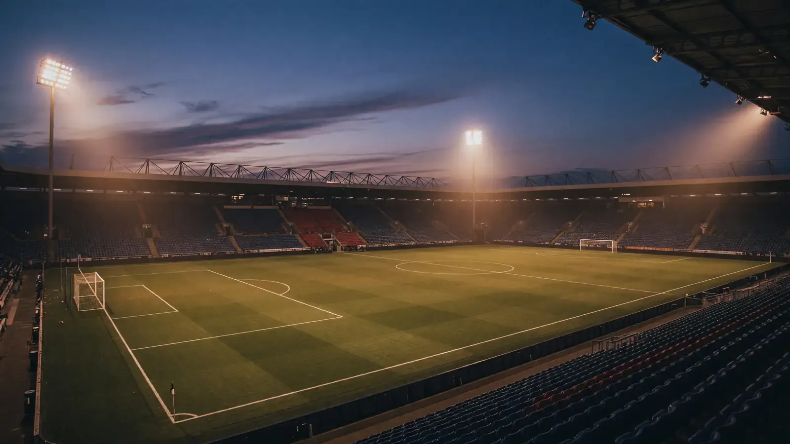 European football stadium at dusk